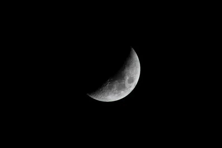 Crescent moon in a black night sky